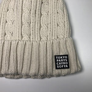 Haute qualité câble tricot gros bonnet <span class=keywords><strong>en</strong></span> <span class=keywords><strong>fausse</strong></span> <span class=keywords><strong>fourrure</strong></span> personnalisé caoutchouc Patch kaki côtelé Pom Pom chapeaux d'hiver unisexe Ski coupe-vent <span class=keywords><strong>Toque</strong></span> - Product Image 2