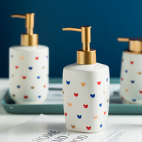 Distributeur de savon liquide en céramique rond moderne et durable, en stock, pour la maison, l'hôtel, la salle de bain