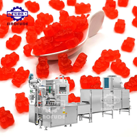 Ligne de production entièrement automatique multifonctionnelle 3D de bonbons en gelée d'amidon de gélatine de pectine de vitamine Machine de fabrication d'ours en gélatine