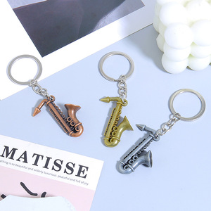 Vente en gros Nouveau design de porte-clés d'<span class=keywords><strong>instruments</strong></span> de musique de simulation en métal Porte-clés saxophone pour mélomanes - Product Image 4
