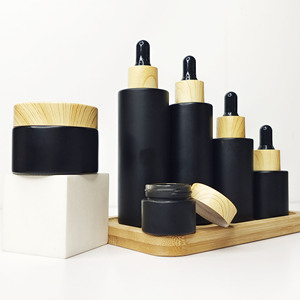 ขวดแก้วใส่เครื่องสำอางสีดำขนาด 30 กรัม แบบกำหนดเองจากโรงงาน สำหรับบรรจุเซรั่มน้ำมันบำรุงเส้นผม ขวดแก้วแบบไหล่เรียบสีด้านพร้อมหัวหยด - Product Image 3