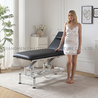 Table de massage pliable moderne, électrique, manuelle et hydraulique, avec cadre métallique et revêtement en cuir haute densité, pour salon de beauté, spa et usage domestique.
