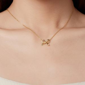 Pendentif nœud papillon en argent sterling S925 de style simple pour la Saint-Valentin avec trou bilatéral pour la fabrication de colliers de bijoux cadeaux de mariage - Product Image 1