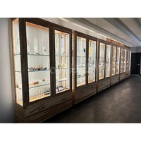 Vitrine de sol à plusieurs niveaux Comptoir en verre pour magasin de détail avec lumière RVB colorée Vitrine en verre pour magasin de fumée