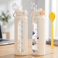 Bouteille d'eau en verre borosilicate Chunmo 32 oz (2 L) anti-fuite avec 2 couvercles (bec verseur et paille), manchon en silicone et design motivant pour boissons chaudes