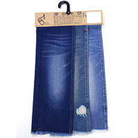 Tissu en denim 11 oz à bas prix, finition mercerisée rigide, double face lisse, pour jeans