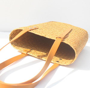 2025 bolsos de mano de paja hechos a mano al por mayor, bolso de compras de <span class=keywords><strong>Rafia</strong></span> de verano, bolsos de playa tejidos de viaje, bolsos de paja para mujer con asa de PU - Product Image 4
