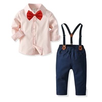 Ensemble formel deux pièces pour garçons comprenant une chemise avec nœud papillon et un pantalon, tenue de cérémonie pour enfants.