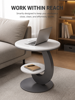 Table d'appoint moderne à deux niveaux avec plateau en dalle de roche et cadre en fer courbé pour salon, hôtel, entrée, chambre