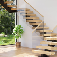 Rampe d'escalier flottante moderne en verre droit pour intérieur avec installation latérale en acier inoxydable et poteaux de fixation en verre