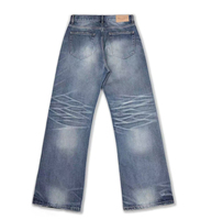 Vêtements de rue pour hommes de haute qualité Pantalons évasés avec broderie croisée de charpentier orange Jeans de détresse pour hommes