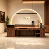 Bureau d'accueil commercial moderne avec décoration en pierre artificielle, idéal pour les projets de hall d'hôtel, prend en charge l'OEM et l'ODM