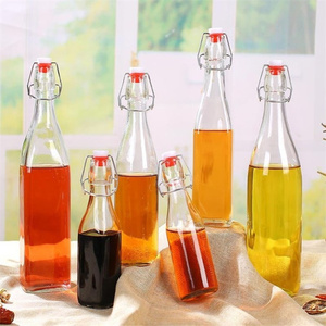 Botellas de vidrio ámbar transparente con tapa abatible a prueba de fugas de 500 ml y 16 oz con tapón para bebidas aceite vinagre Kombucha almacenamiento de agua - Product Image 6