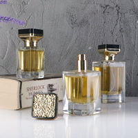 Flacon de parfum carré de luxe en verre épais 30ml 50ml 100ml avec atomiseur à pression en aluminium sérigraphié or