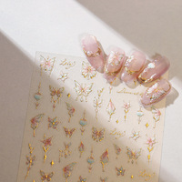 Autocollants pour ongles en forme de papillon et de branche de fleurs en or rose, design élégant et luxueux pour la manucure DIY à domicile