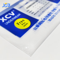 Vente en gros de sacs en plastique zip-lock refermables en PVC givré imprimés personnalisés pour l'emballage de vêtement de t-shirt