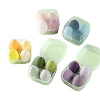 Boîte brevetée à quatre grilles ensemble de houppette avec gourde goutte d'eau biseautée coupe échantillon gratuit oeuf maquillage coton pour la beauté