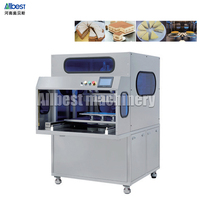 La machine ultrasonique de découpe de gâteaux utilise une technologie avancée pour trancher efficacement les gâteaux de mousse réfrigérés.