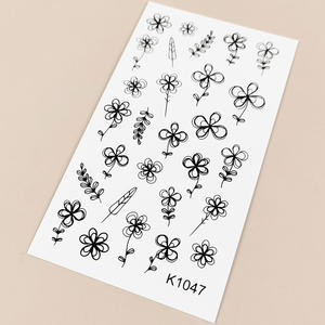 Autocollants de <span class=keywords><strong>tatouage</strong></span> temporaires de luxe pour le corps, les <span class=keywords><strong>bras</strong></span>, le maquillage, imperméables, à motif de petite fleur noire en forme d'étoile de dessin animé, vente en gros OEM - Product Image 6