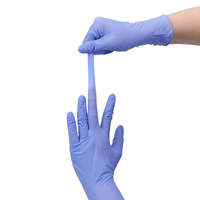 Gants en nitrile bleus jetables sans poudre, boîte de 100 pièces, utilisation en beauté, bon prix