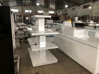 Étagère de présentation de sacs à main à double face en métal léger, personnalisée en usine, pour boutique de vêtements, comptoir