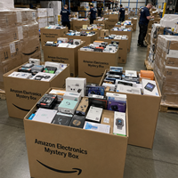 Boîte mystère d'électronique Amazon : Smartphone, tablette, console portable, haut-parleur, bracelet intelligent, appareil photo pour la revente en gros