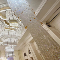 Lustre en cristal LED long de décoration d'intérieur de luxe de plafond haut de gamme de lumières pendantes de villa d'escalier tournant d'hôtel