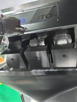 Machine de remplissage et de scellage semi-automatique pour granulés de qualité alimentaire, compatible avec plusieurs matériaux et facile à utiliser