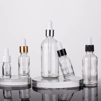 Flacon compte-gouttes en verre transparent de 30 ml, directement de l'usine, avec emballage en boîte sérigraphiée pour huiles essentielles, parfums, sérums cosmétiques
