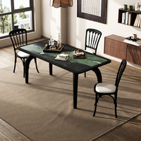 Table à manger nordique en marbre avec table et chaises en travertin de luxe modernes en bois massif noir pour appartement ou villa