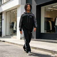 Ensemble streetwear unisexe coupe-vent respirant grande taille avec sweat à capuche color block et pantalon de survêtement évasé oversize 2 pièces