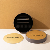 Boîte cadeau ronde rigide en papier personnalisée Lionwrapack avec couvercle doré et insert floqué noir