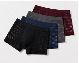 Calzoncillos bóxer transpirables de punto sin costuras con logotipo para hombre, ropa interior de secado rápido - Product Image 1