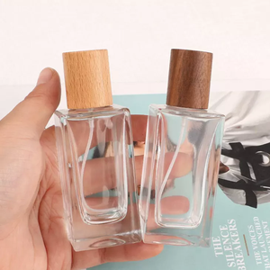Offre Spéciale forme rectangulaire vide en verre clair rechargeable 30ml 50ml 100ml <span class=keywords><strong>bouchon</strong></span> de <span class=keywords><strong>bouteille</strong></span> de parfum en bois - Product Image 2