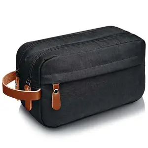 Yiwu กระเป๋าเครื่องสำอางสีดำสำหรับผู้ชายกระเป๋าเครื่องสำอางกันน้ำกระเป๋าแต่งหน้าสองชั้นกระเป๋าหนังแบบพกพา