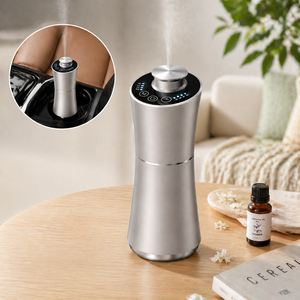 Diffuseur de parfum automatique portable pour voiture UCK Luxury Wireless Car Scent Machine (vente en gros OEM) - Product Image 1