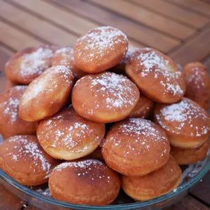 Venta caliente donut Maker Berliner krapfen línea de producción freidora e inyector donut sin máquina para hacer agujeros