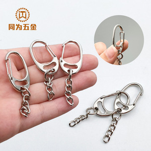 Llavero de cadena con cierre en D, aleación de zinc, ovalado, plateado, 60 mm x 18 mm, resistente, para accesorios de peluches, venta al por mayor - Product Image 1