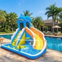 Parc aquatique gonflable sur le thème des dauphins avec piscine à jets, mur d'escalade et toboggan, en PVC de qualité commerciale pour la location par les enfants