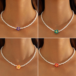 Collana con Fiori in Resina Stile Vacanza Estiva Europea e Americana, Collana Bohémien con Perline di Frangipani - Product Image 1