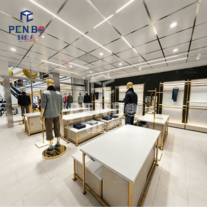 Aménagement intérieur de boutique de vêtements pour hommes au design moderne et haut de gamme, présentoirs à vêtements autoportants dorés sur mesure pour magasin de détail - Product Image 5