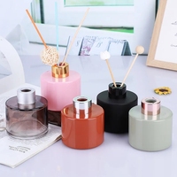 Bouteille en verre de parfum de maison de luxe de couleur personnalisée 50ml 100 150 200 500 Bouteilles vides de diffuseur d'arôme à roseaux avec boîte