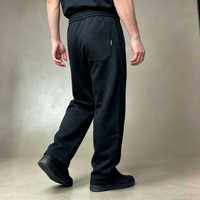 Celana Panjang Hitam Longgar Model Kaki Lebar Pria Pinggang Elastis Tali Serut Kepang Saku Celah Saku Tempel Streetwear Grosir