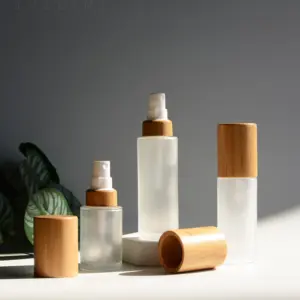 Lüks sprey şişesi 20ml 30ml 50ml 60ml 80ml 100ml 120ml mat cam sprey tüm bambu kap DIY logo odası parfüm sprey kabı