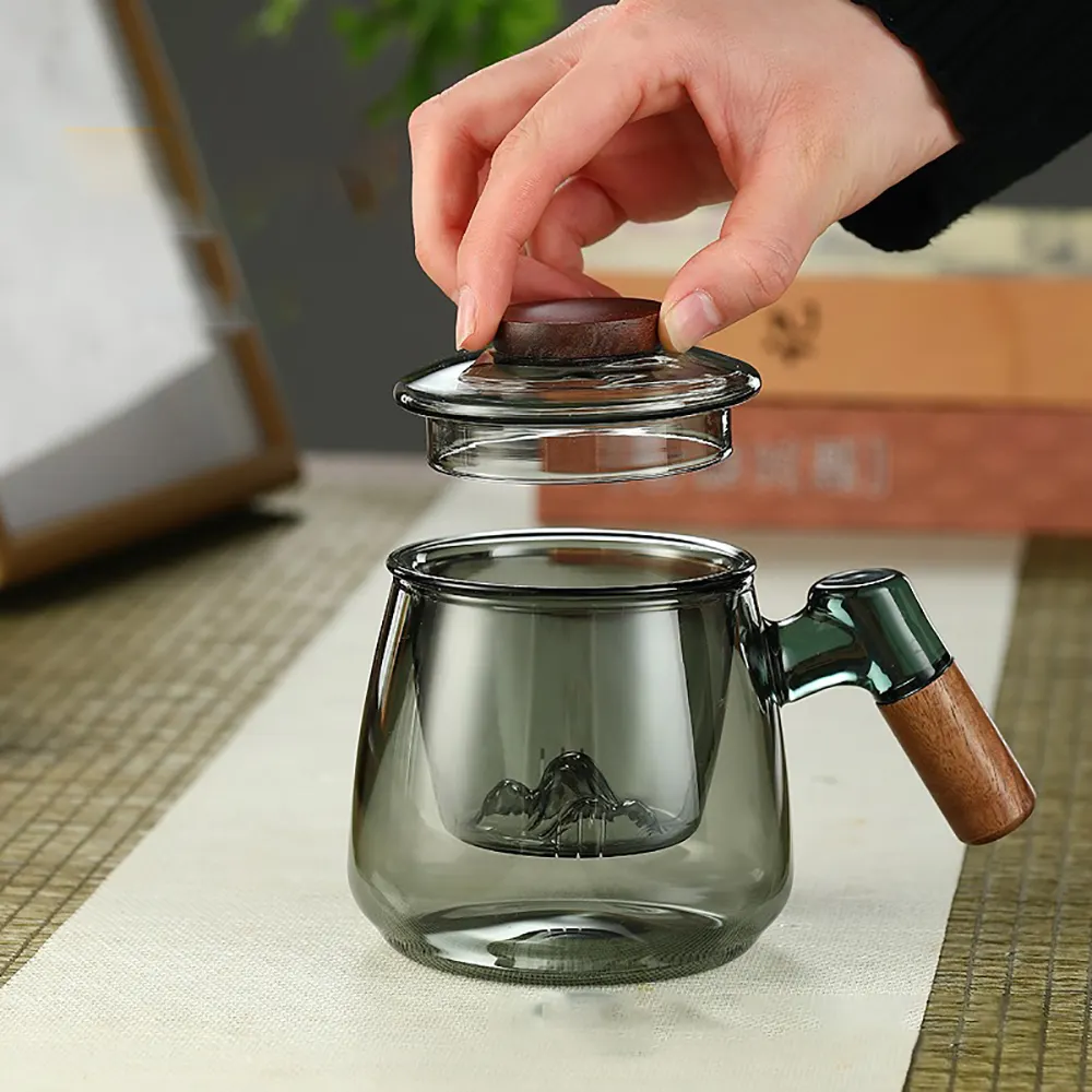 गर्म बिकने वाला उत्पाद पारदर्शी ग्लास कॉफी मग होम ऑफिस हीटिंग ग्लास चाय इन्फ्यूज़र ढक्कन के साथ डबल वॉल ग्लास कप