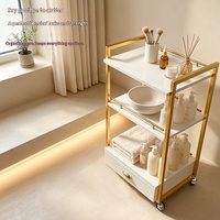 Chariot de Salon de Beauté à 3 Niveaux avec Tiroir, Cadre Métallique Doré, Chariot de Rangement Mobile à Roulettes pour Utilisation en Spa et Salon