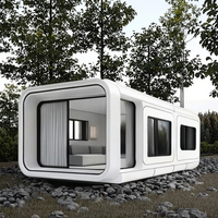 Vente en gros de serres préfabriquées Apple modernes Modules de cabine de bureau mobile pour la conception graphique de l'école du parc Capacité de projet