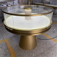 Vitrine à bijoux ronde sur mesure, comptoir d'îlot, vitrines à bijoux en métal doré et verre, éclairage LED, logo lumineux, luxe, vente au détail, OEM D...