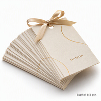 Étiquettes de vêtements en carton texturé coquille d'œuf avec détails en creux et code-barres pour marques de vêtements de créateurs et tailles personnalisées