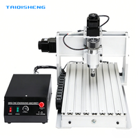 Machine de gravure CNC 2 en 1 3040 avec changeur d'outils rotatif pour travaux d'art métallique DIY
